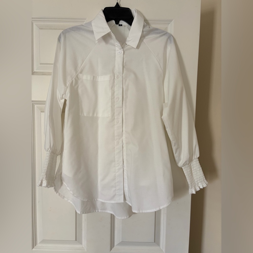 Oversized White Button-Up Blouse with smocked cuff at end of sleeve